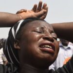 NIGERIAN WOMAN CRIES OUT