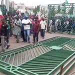 Protesters Pull Down National Assembly Gate in Abuja